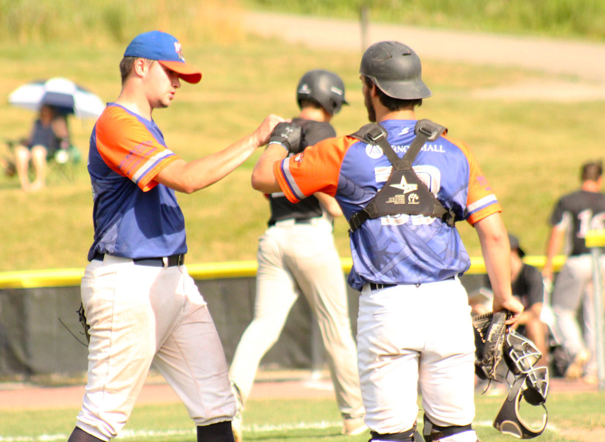 Brandon Quigley and John Wheeler celebrate scoreless inning